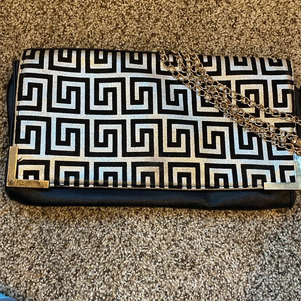 Fornasetti-inspired geometric print handbag